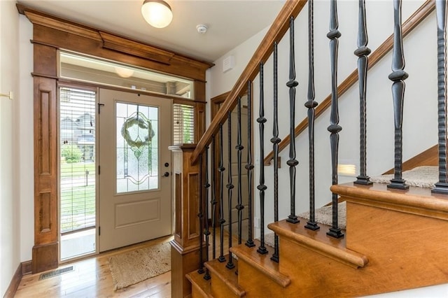 entrance foyer with light hardwood / wood-style flooring