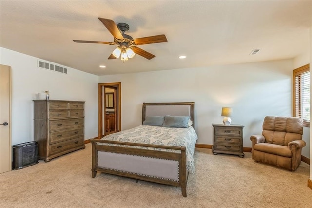 carpeted bedroom featuring ceiling fan