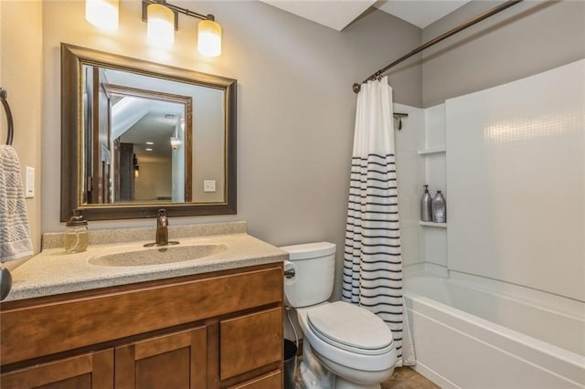 full bathroom featuring vanity, toilet, shower / bath combo with shower curtain, and tile patterned flooring