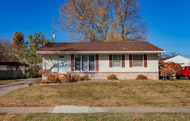 view of front of home with a front yard