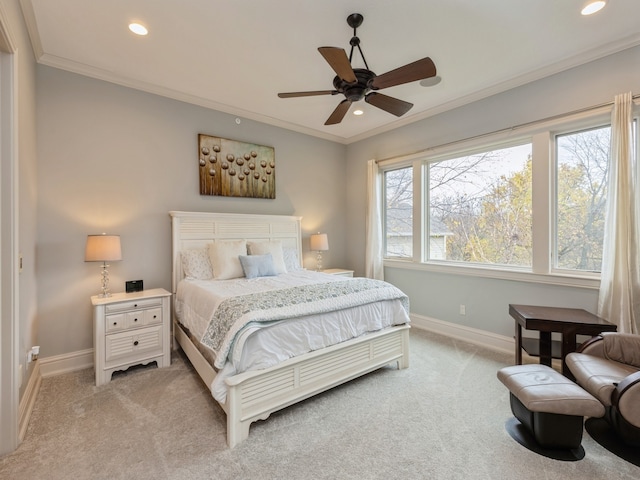 bedroom with crown molding, recessed lighting, light colored carpet, a ceiling fan, and baseboards