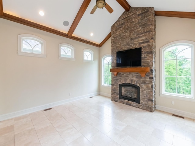 3123 162nd St, Urbandale, IA 50323 - unfurnished living room featuring a ceiling fan, beamed ceiling, a fireplace, baseboards, and light tile patterned floors