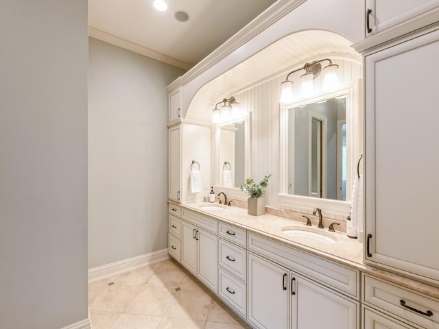 3123 162nd St, Urbandale, IA 50323 - full bathroom with double vanity, crown molding, and baseboards