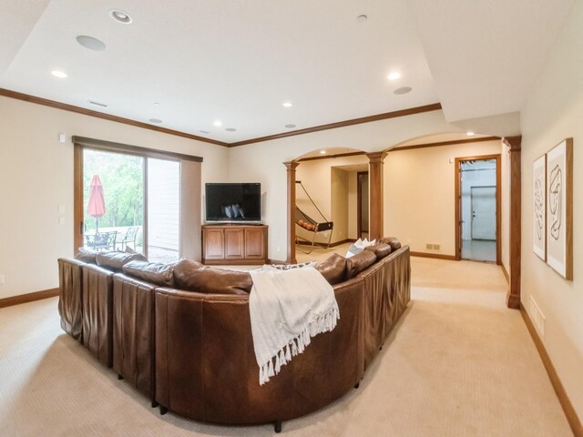 3123 162nd St, Urbandale, IA 50323 - living area with ornate columns, light carpet, baseboards, arched walkways, and recessed lighting