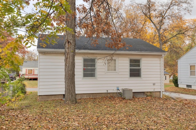 view of side of home with cooling unit