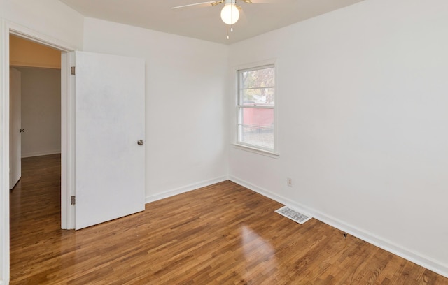 unfurnished bedroom with hardwood / wood-style flooring and ceiling fan