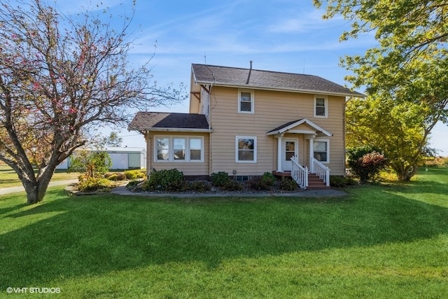 view of front of home featuring a front yard