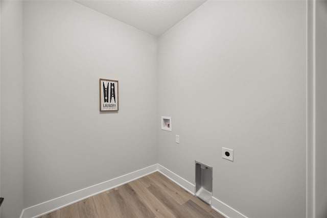 laundry room with hookup for an electric dryer, light wood-type flooring, and hookup for a washing machine