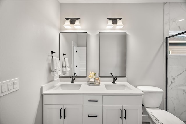 bathroom featuring vanity, toilet, and walk in shower