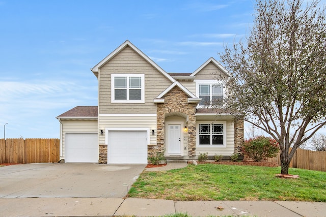 view of front of house featuring a front lawn and a garage