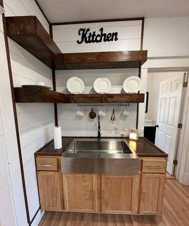 kitchen featuring sink and light hardwood / wood-style flooring