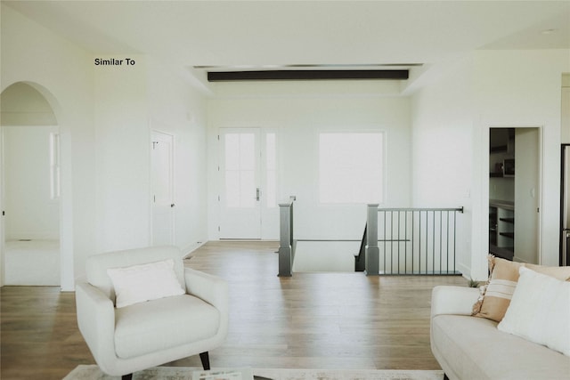 living area with hardwood / wood-style floors