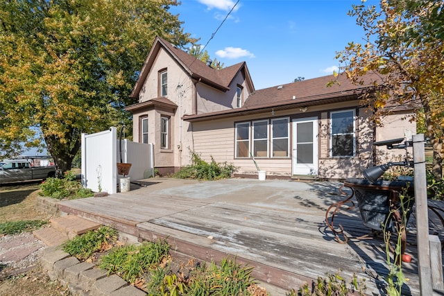 rear view of house featuring a patio