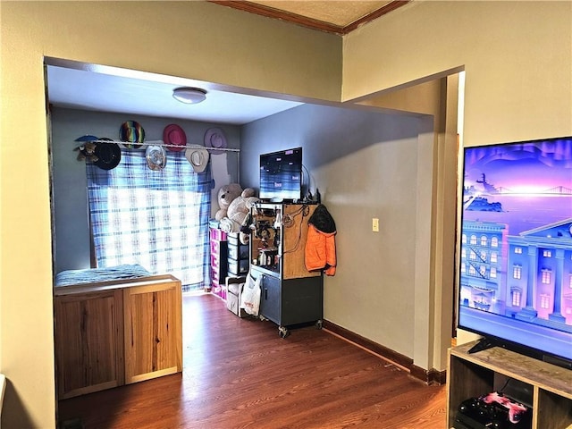 interior space with dark wood finished floors and baseboards