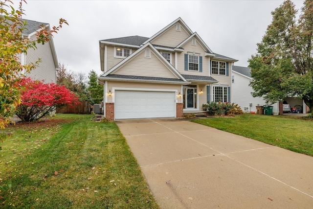 craftsman-style home featuring a front yard and a garage