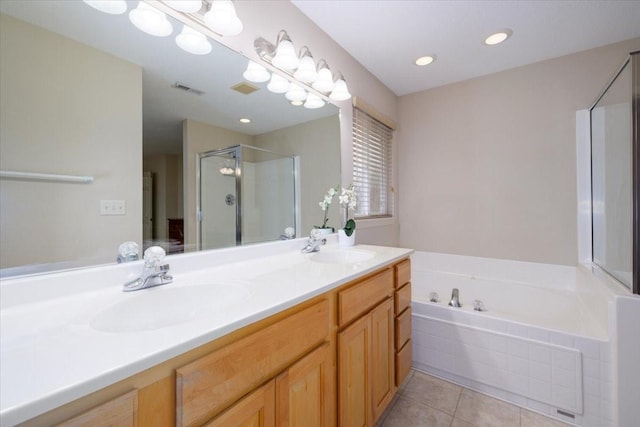 bathroom with tile patterned floors, vanity, and plus walk in shower