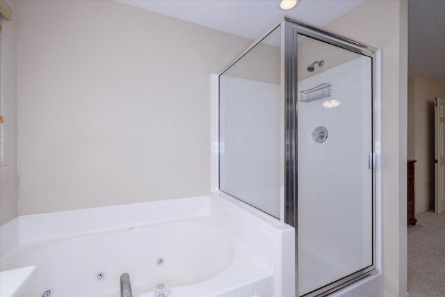 bathroom with shower with separate bathtub