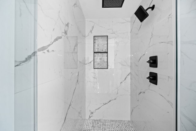 details featuring a tile shower