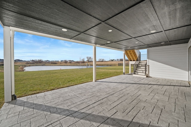 view of patio / terrace featuring a water view