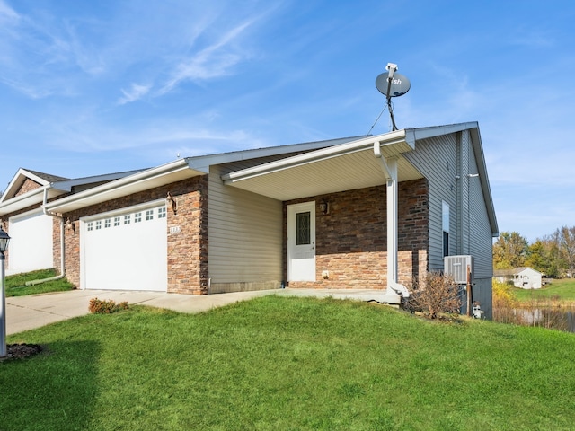 single story home with a garage, central AC unit, and a front lawn