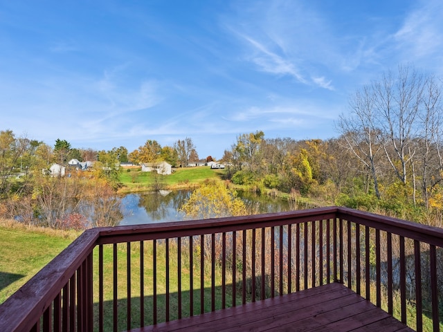 wooden deck with a water view