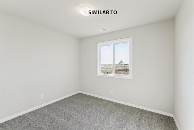 view of carpeted spare room