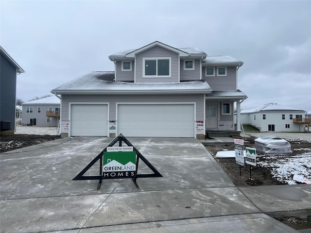 view of front of home featuring a garage