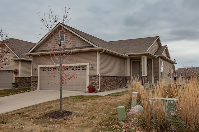 craftsman-style home with a garage