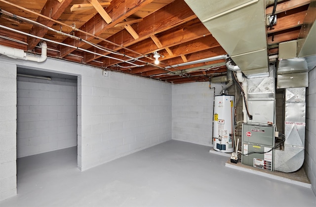 basement featuring gas water heater and heating unit