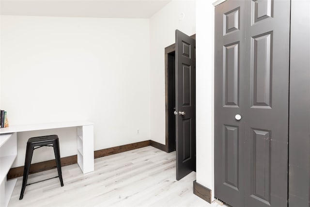 home office featuring light hardwood / wood-style floors