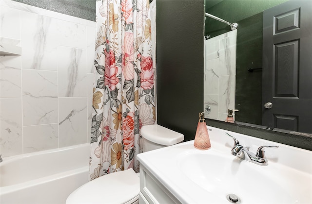 full bathroom with vanity, toilet, and shower / tub combo