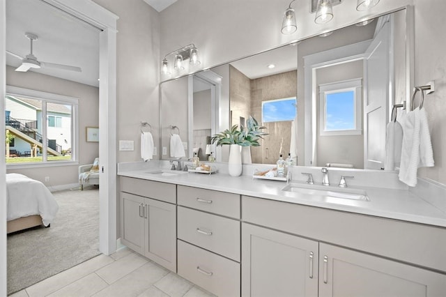 bathroom featuring vanity, ceiling fan, and tile patterned floors