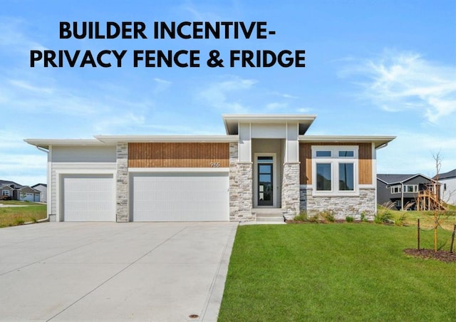 prairie-style home featuring a garage, concrete driveway, a front lawn, and stone siding