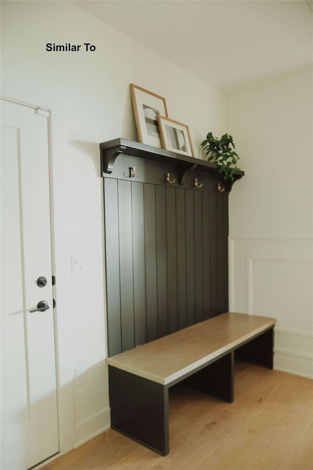 mudroom with light hardwood / wood-style floors