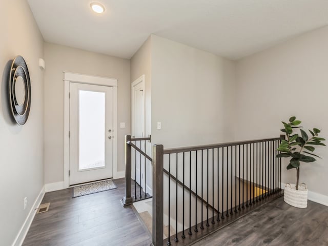 entrance foyer featuring hardwood / wood-style flooring