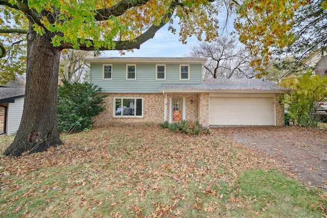 front of property with a garage