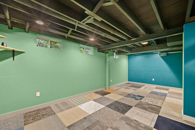 basement featuring carpet flooring