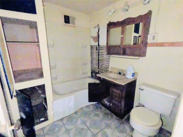 full bathroom with vanity, toilet, and shower / tub combination