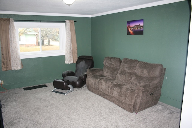 living room with carpet flooring and ornamental molding