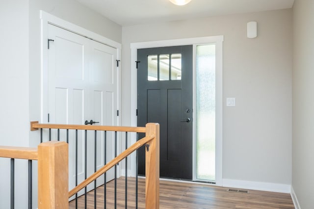 2640 Abbott Dr, Waukee, IA 50263 - entrance foyer featuring wood finished floors and baseboards