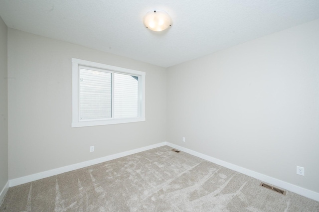2640 Abbott Dr, Waukee, IA 50263 - carpeted spare room featuring baseboards