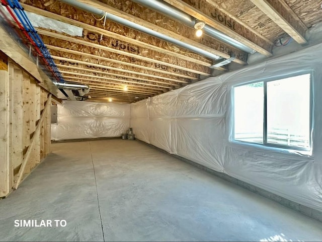 basement featuring electric panel