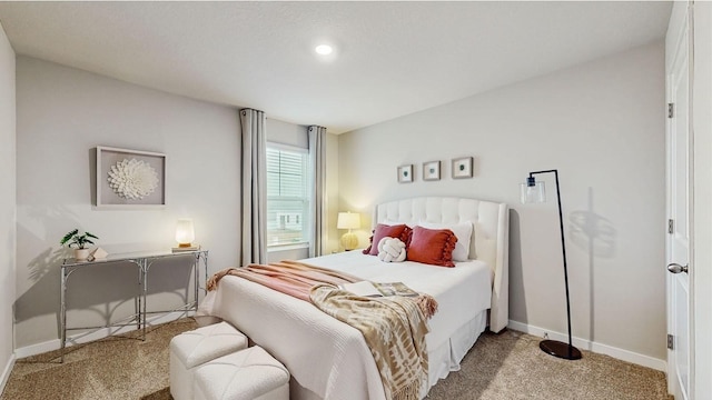 bedroom with light colored carpet