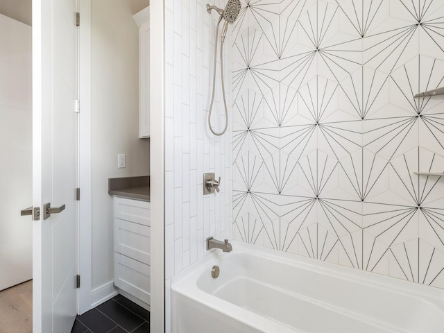 18176 Alderleaf Dr, Clive, IA 50325 - bathroom with shower / bathtub combination and baseboards