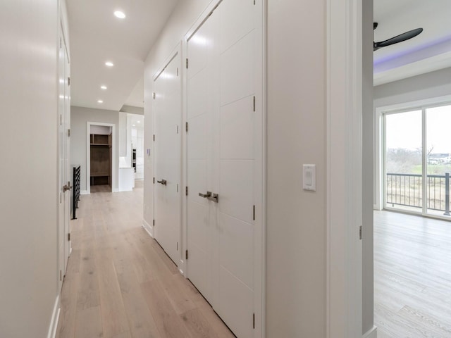 18176 Alderleaf Dr, Clive, IA 50325 - hall with light wood-type flooring, recessed lighting, and baseboards