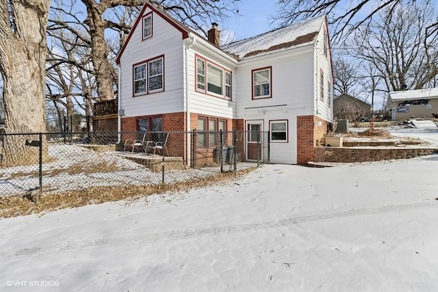 view of front of home featuring cooling unit