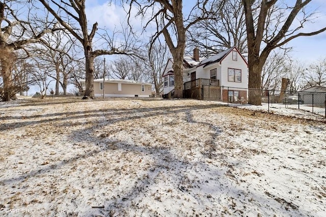 view of yard covered in snow