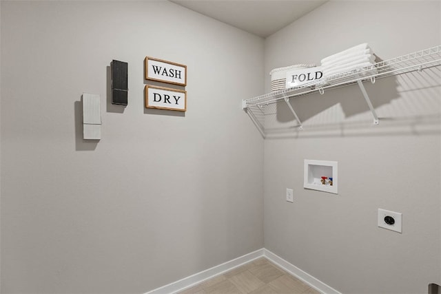 clothes washing area featuring washer hookup, laundry area, hookup for an electric dryer, and baseboards