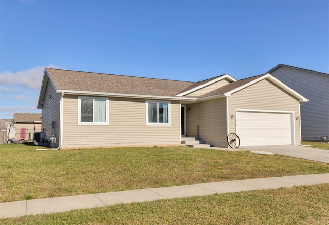 ranch-style home with central air condition unit, a garage, and a front yard