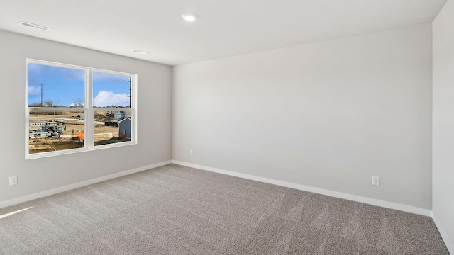 view of carpeted spare room